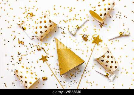 Celebration background - party accessories in golden colors. Stock Photo