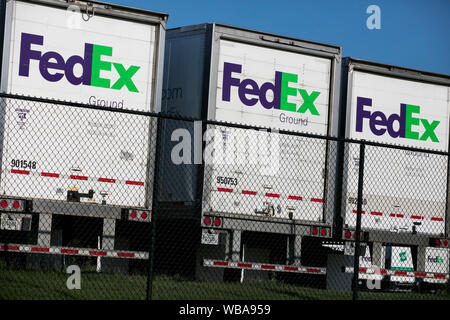 FedEx Ground logos on truck trailers at a FedEx distribution center in Twinsburg, Ohio on August 10, 2019. Stock Photo