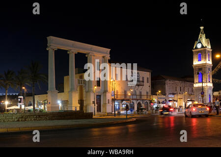 View at night of the Jaffa Clock-Tower square on Yefet Street in the southern and oldest part of Tel Aviv-Jaffa, Israel Stock Photo