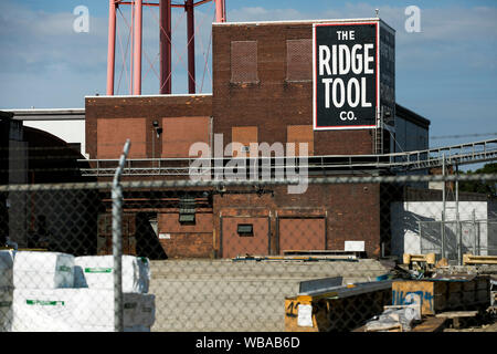 A logo sign outside of the headquarters of The Ridge Tool Company, maker of Ridgid brand tools, in Elyria, Ohio on August 11, 2019. Stock Photo