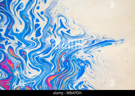 Abstract colorful painting background made in fluid art technique. Trendy multicolored pattern. Stock Photo