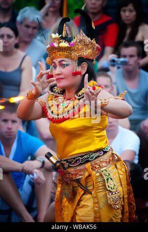 Kecak dancer during the daily performance at sunset for tourists. Pura Luhur Uluwatu Temple, Kuta South, Bali, Indonesia Stock Photo