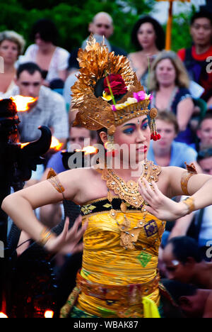 Kecak dancer during the daily performance at sunset for tourists. Pura Luhur Uluwatu Temple, Kuta South, Bali, Indonesia Stock Photo