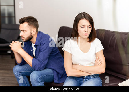 Couple in quarrel on sofa Stock Photo