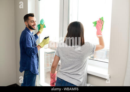 Couple doing housework together on weekend Stock Photo