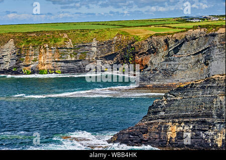 Bromore Cliffs, County Kerry, Republic of Ireland form part of the Wild Atlantic Way, a tourist route that follows the west coast of Ireland. Stock Photo