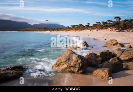 Sunny morning at the beach of the wineglass-bay, Tasmania Australia, lively water Stock Photo