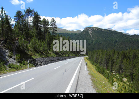 Road to Ofenpass (other name: Fuorn pass) in Swiss National Park, canton Grisons (Graubunden), Switzerland. Stock Photo