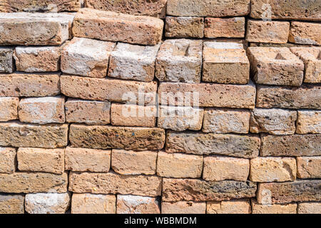 A collection of recycled old bricks. The bricks are cleaned from mortar and concrete and ready for reuse. Stock Photo