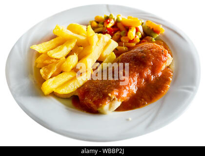 Appetizing cod fillet cooked in tomato sauce served with vegetable garnish. Isolated over white background Stock Photo