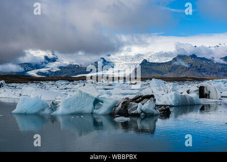 Panorama of the Jökulsárlón lake with its ice chunks floating on water, Iceland Stock Photo