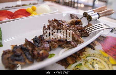 Beef meat kebab on the metal skewer Stock Photo