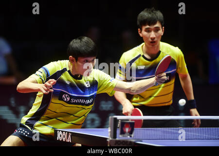 From left winners CHO Daeseong and  SHIN Yubin - both of Korea in action during the men´s doubles title table tennis's Czech Open the 2019 ITTF World Tour match, in Olomouc, Czech Republic, August 24, 2019. (CTK Photo/Ludek Perina) Stock Photo