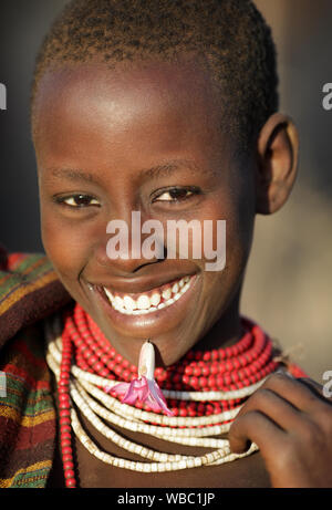 Beautiful tribal Karo girl in Koricho, Lower Omo Valley, Ethiopia Stock Photo