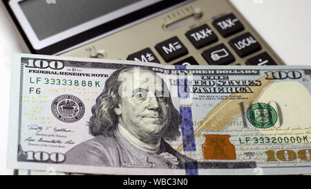 Cash of hundred dollar bills. A pile of one hundred US banknotes .100 Dollar. Stock Photo