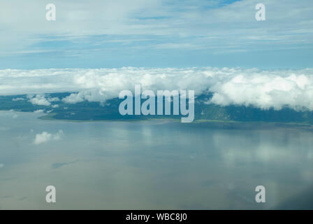 Aerial view of Lake Manyara and the rainforest covered escarpment of the Rift Valley (Tanzania) Stock Photo