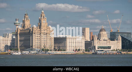 Liverpool's Three Graces - The Royal Liver Building, the Cunard Building and the Port of Liverpool Building on the historic waterfront on the River Me Stock Photo