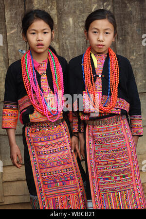 Akha girl at New Year ceremony near Phongsaly, Laos. The ethnic minority Akha have still been subject to rights abuses in Laos. Stock Photo