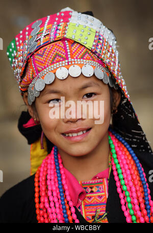 Akha girl at New Year ceremony near Phongsaly, Laos. The ethnic minority Akha have still been subject to rights abuses in Laos. Stock Photo