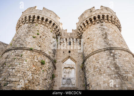 The Marine Gate towers, one of the gateways into Rhodes Medieval Old Town, Rhodes Island, Greece Stock Photo