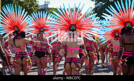 London, UK.  26 August 2019.  Participants take part in the Grand Finale Parade at the Notting Hill Carnival.  Over one million revellers are expected to visit Europe's biggest street party over the Bank Holiday Weekend in a popular annual event celebrating Caribbean culture.  Credit: Stephen Chung / Alamy Live News Stock Photo