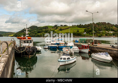Union Hall, West Cork, Ireland. 26th Aug, 2019. Small boats lie in Union Hall Fishing Harbour under a cloudy sky. The afternoon will see a mix of sushine and showers.with highs of 17 to 22 C. Credit: Andy Gibson/Alamy Live News. Stock Photo