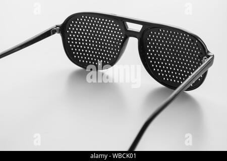 perforated glasses for vision correction