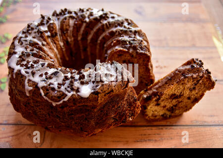 Banana bread with glase and nuts and chocolate chips Stock Photo