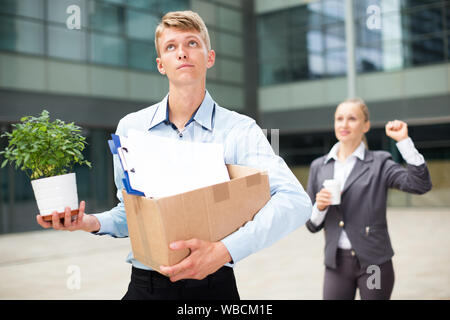 Boss woman is wishing good luck to office worker on new workplace Stock ...