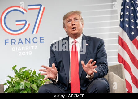 Biarritz, France. 26th Aug, 2019. US President Donald Trump gestures at the beginning of bilateral talks with Chancellor Merkel in the margins of the G7 summit. The summit will take place from 24 to 26 August in Biarritz. Credit: dpa picture alliance/Alamy Live News Stock Photo