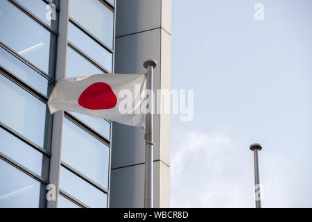 Chiba, Japan, 08/26/2019 , Japanese flag in front of the Kenkeisatsuhonbu, the Chiba prefectural police headquarters, Stock Photo