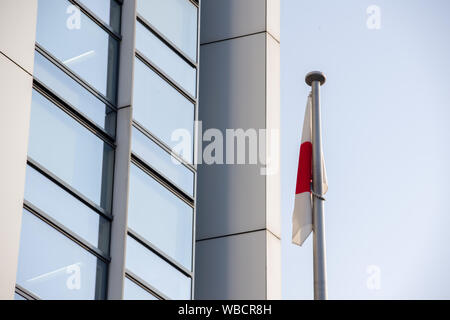 Chiba, Japan, 08/26/2019 , Japanese flag in front of the Kenkeisatsuhonbu, the Chiba prefectural police headquarters, Stock Photo