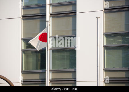 Chiba, Japan, 08/26/2019 , Japanese flag in front of the Kenkeisatsuhonbu, the Chiba prefectural police headquarters, Stock Photo