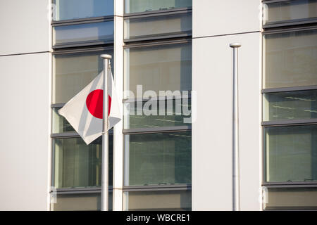 Chiba, Japan, 08/26/2019 , Japanese flag in front of the Kenkeisatsuhonbu, the Chiba prefectural police headquarters, Stock Photo