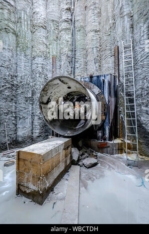 Gelsenkirchen, Ruhr area, North Rhine-Westphalia, Germany - canal construction at the Holzbach, tunnel boring machine enters the shaft, the Holzbach i Stock Photo