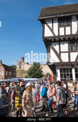 Crowds gather in Castle Hill market square for the annual Steampunk Festival at historic city of Lincoln, Lincolnshire, UK Stock Photo