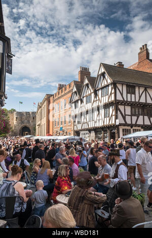 Crowds gather in the historic market square for the annual Lincoln Steampunk Festival, August, Lincolnshire, UK Stock Photo