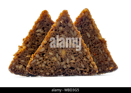 Slices of rye bread with seeds on a white background Stock Photo