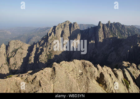 Aiguilles de Bavella from Punta Velaco, evening, France, Corsica Stock Photo