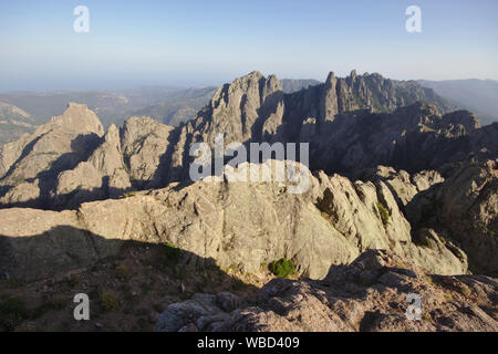 Aiguilles de Bavella from Punta Velaco, evening, France, Corsica Stock Photo