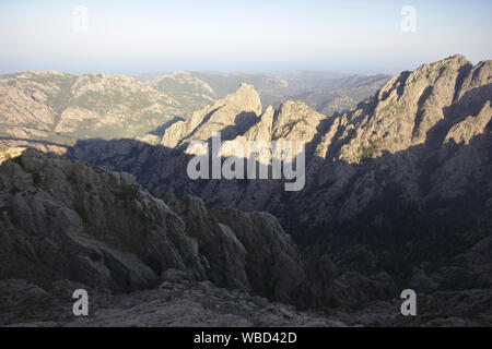 Aiguilles de Bavella from Punta Velaco, evening, France, Corsica Stock Photo