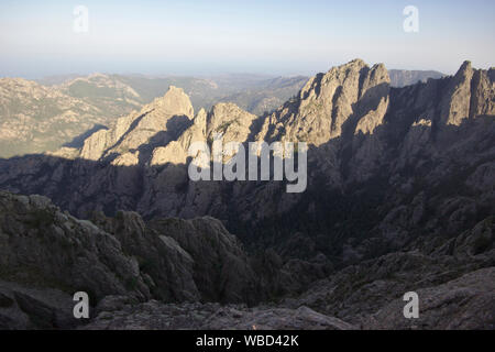 Aiguilles de Bavella from Punta Velaco, evening, France, Corsica Stock Photo