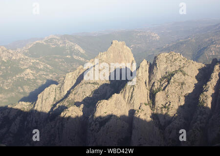 Aiguilles de Bavella from Punta Velaco, evening, France, Corsica Stock Photo