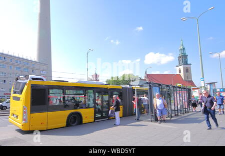 People travel by bus in downtown Berlin Germany Stock Photo