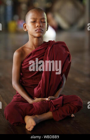 Young Burmese Buddhist novices in a monastic school in Bagan, Myanmar. Stock Photo