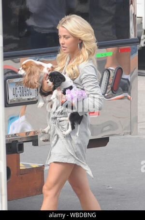 HOLLYWOOD, FL - MAY 23:   Julianne Hough and Diego Boneta on set the first day of filming  Rock of Ages' starring Tom Cruise..  Julianne was seen walking her two dogs in-between takes.   On May 23, 2011 in Miami Beach, Florida.    People:   Julianne Hough Diego Boneta Stock Photo