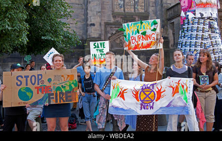 Edinburgh, Scotland, UK. 26th Aug, 2019. Approximately fifty demonstrators assembled peacefully in the High Street outside St Giles Cathedral to demonstrate against the the UK Governments 'criminal inaction on the climate and ecological crisis' the group classed it as a Non Violent Extinction Rebellion. They were accompanied by a minimum of twenty uniformed Police Officers. They claim they are protesting to persuade the government to take emergency action on the Climate and Ecological crisis. Stock Photo