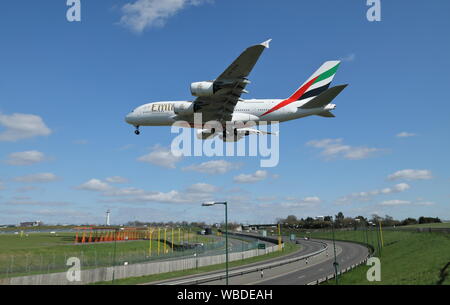 Emirates Airbus A380 passenger airliner, serial number A6-EVA, landing at Birmingham International airport in the UK.