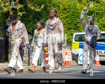 A group of revellers who played 'dirty mas' during the celebration.The main events of Notting Hill Carnival 2019 got underway, with over a million revellers hitting the streets of West London, amongst floats, masqueraders, steel bands, and sound systems. Stock Photo