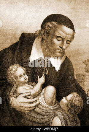 A vintage religious portrait of St Vincent de Paul (1581-1660) with two children. The former French priest is patron saint of  charities, the poor, horses,hospitals,leprosy,lost articles,Madagascar,prisoners,Richmond, Virginia,spiritual help and volunteers and other charitable causes Stock Photo